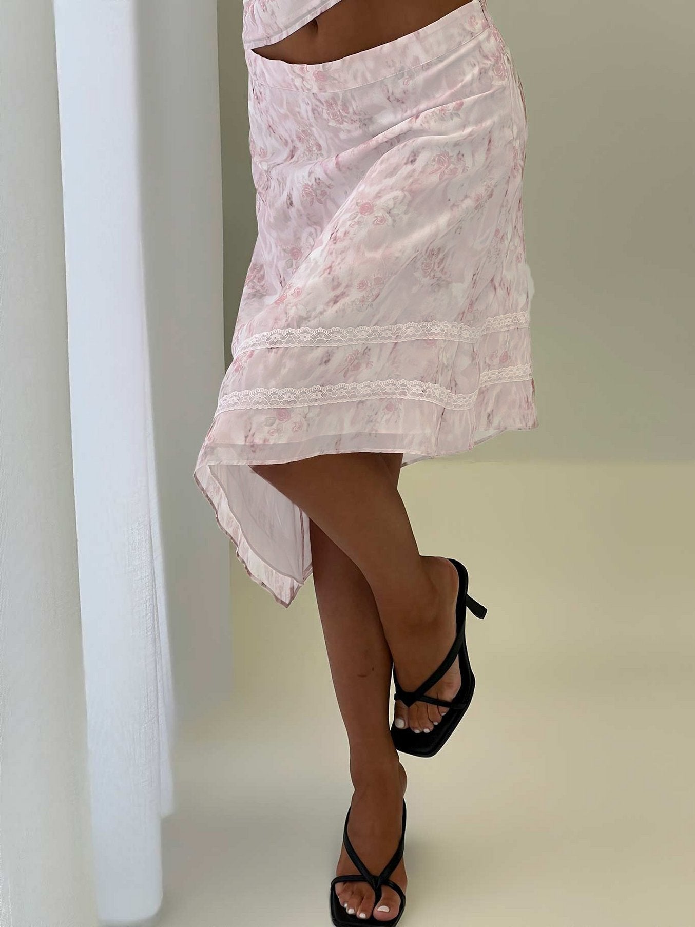 Avaline Asymmetrical Midi Skirt Pink women's skirt by Ellevoria