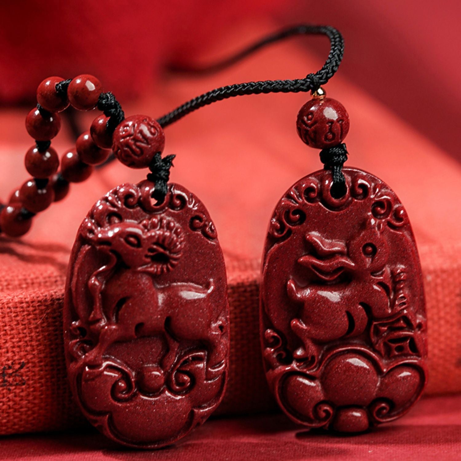 Hand-Carved Cinnabar Zodiac Cloud Pendants