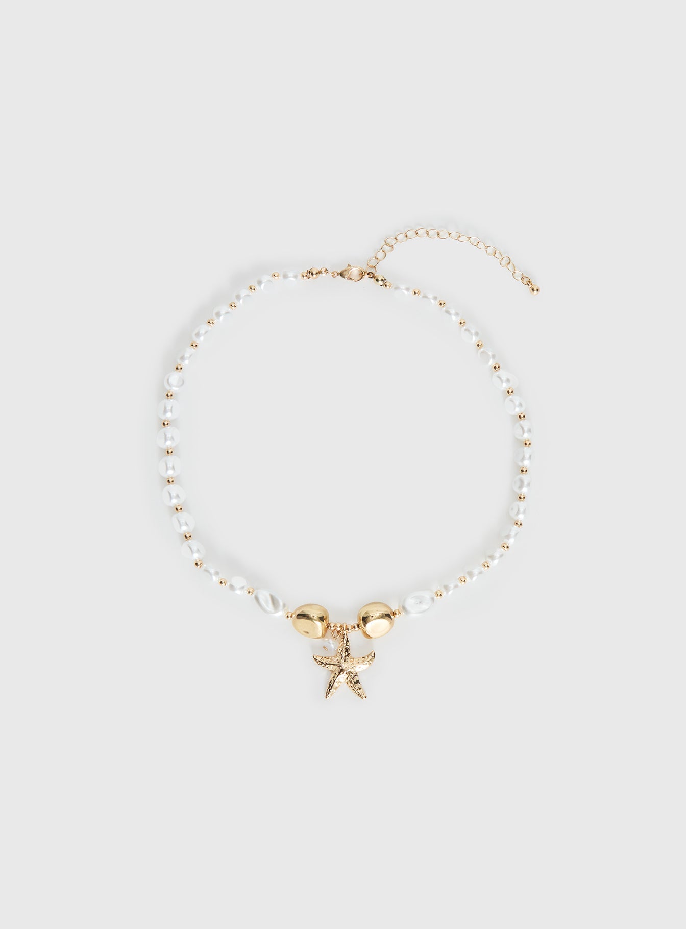 Splashy Star Pendant Necklace Gold women's necklace by Ellevoria