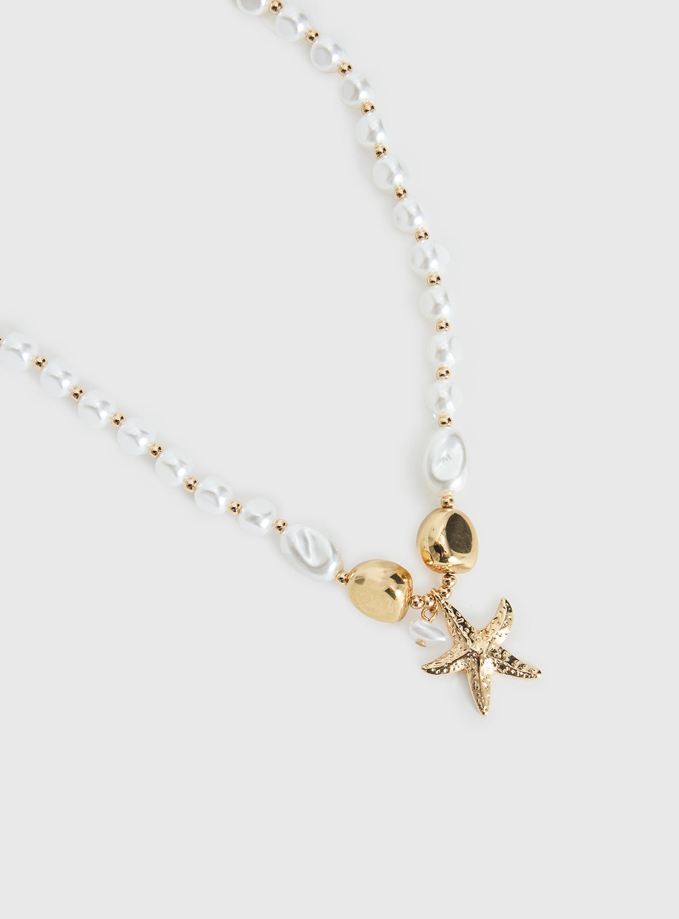 Splashy Star Pendant Necklace Gold women's necklace by Ellevoria