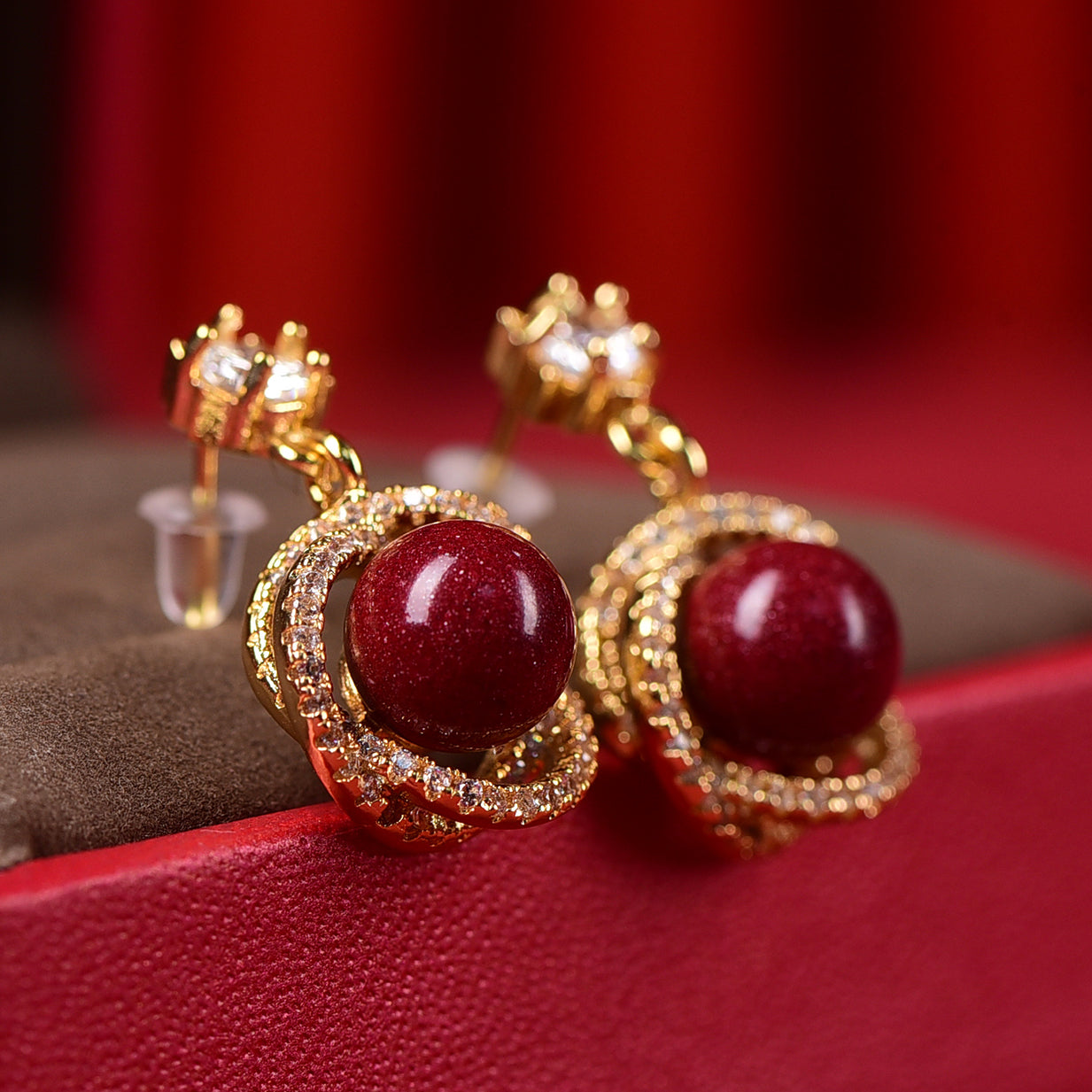 18K Gold Rotating Cinnabar Earrings - Zircon Snowflake Design
