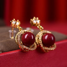 18K Gold Rotating Cinnabar Earrings - Zircon Snowflake Design