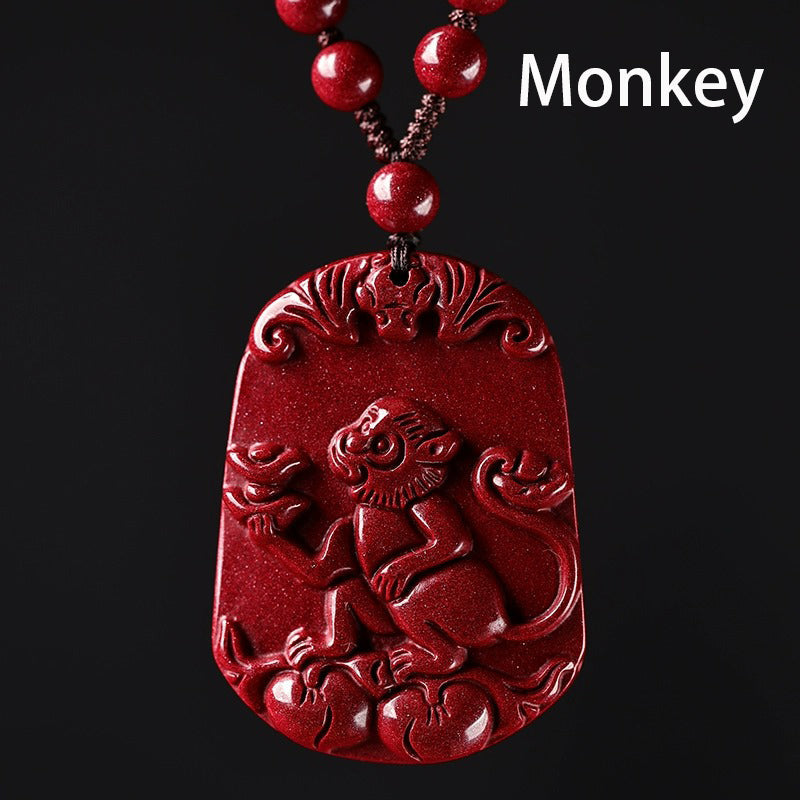 Hand-Carved Cinnabar Zodiac Pendants